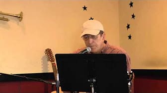 A man singing with a mick to his mouth
